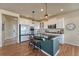 Bright kitchen features granite countertops, stainless steel appliances, and ample cabinet space at 23593 E Eads Dr, Aurora, CO 80016