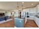 Modern kitchen boasts granite countertops, stainless steel appliances, and an open layout at 23593 E Eads Dr, Aurora, CO 80016