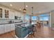 Modern kitchen boasts granite countertops, stainless steel appliances, and a spacious island at 23593 E Eads Dr, Aurora, CO 80016