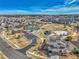Aerial view of a community with tennis courts, a playground, covered picnic area and walking trails at 23593 E Eads Dr, Aurora, CO 80016