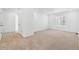 Bedroom with neutral walls, plush carpet, and a window at 16651 W 93Rd Ave, Arvada, CO 80007