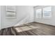 Neutral bedroom with hardwood floors and bright windows at 16651 W 93Rd Ave, Arvada, CO 80007