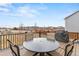 Back deck with space for table and chairs with view of open space at 19120 E Pacific Pl, Aurora, CO 80013