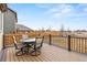 Back deck with space for table and chairs with view of open space at 19120 E Pacific Pl, Aurora, CO 80013