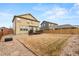 Wide backyard with a deck for sitting and relaxing at 19120 E Pacific Pl, Aurora, CO 80013