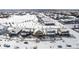 Winter street view of charming homes with snow-covered roofs and well-maintained yards in a Gathering-friendly neighborhood at 19120 E Pacific Pl, Aurora, CO 80013