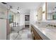 Gorgeous bathroom featuring a glass shower, soaking tub, dual sink vanity, and ample storage at 4121 S Cherry St, Cherry Hills Village, CO 80113