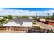 Home exterior featuring a fenced backyard, lawn, landscaping, and neighborhood views at 3296 S Bryant St, Englewood, CO 80110