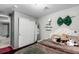 Well-organized bedroom featuring closet space, a comfortable bed, and personalized decor for a cozy atmosphere at 3296 S Bryant St, Englewood, CO 80110