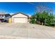 Charming single-Gathering home featuring a large two-car garage and neutral siding with mature trees at 3296 S Bryant St, Englewood, CO 80110