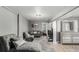 Neutral toned living room showcasing comfortable seating, rug and stylish decor at 3296 S Bryant St, Englewood, CO 80110