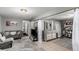 Cozy living area featuring comfortable seating, neutral decor, and stylish tile flooring at 3296 S Bryant St, Englewood, CO 80110