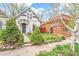 Street view of a charming home with a well-maintained front yard and landscaping at 3289 Perry St, Denver, CO 80212