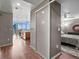 Hallway showcasing kitchen, dining area, and bedroom at 891 14Th St # 3410, Denver, CO 80202