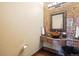 Powder room with a vessel sink and decorative tile at 83 Castle Pines N Dr, Castle Rock, CO 80108