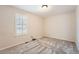 Neutral bedroom with neutral carpet, light walls, window, and ample natural light at 23808 E Bellewood Dr, Aurora, CO 80016
