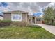 Attractive single-Gathering home with lush green lawn, brick facade and ample natural light at 23808 E Bellewood Dr, Aurora, CO 80016
