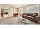 Comfortable living room with stylish furniture, neutral tones, and plenty of natural light at 23808 E Bellewood Dr, Aurora, CO 80016