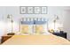 Comfortable bedroom with decorative pillows and bedside lamps at 1100 Pontiac St, Denver, CO 80220