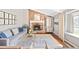 Inviting living room featuring a fireplace, hardwood floors, comfortable seating and charming decor at 1100 Pontiac St, Denver, CO 80220