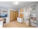 Charming office space with ample storage, computer desk, and woven rug at 1100 Pontiac St, Denver, CO 80220