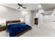 This bedroom offers soft neutral colors and includes an attached bathroom and closet at 741 Green Mountain Dr, Erie, CO 80516