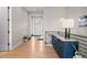 Welcoming entryway featuring modern decor, luxury vinyl floors and a large window at 741 Green Mountain Dr, Erie, CO 80516