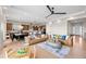 Spacious open-concept living space combining living, dining, and kitchen areas with modern finishes at 741 Green Mountain Dr, Erie, CO 80516