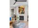 Cozy living room space featuring a fireplace, stylish decor, and comfortable seating at 741 Green Mountain Dr, Erie, CO 80516
