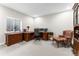 This home office features a large window and a traditional wooden desk at 741 Green Mountain Dr, Erie, CO 80516