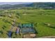Expansive green space with well-maintained tennis courts and ample parking at 513 Mt Blue Sky Rd, Golden, CO 80401