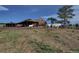 Rustic barn with horses, blending rural charm and practical equestrian facilities at 513 Mt Blue Sky Rd, Golden, CO 80401