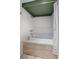 Relaxing bathtub with tiled surround and overhead shower, perfect for unwinding at 513 Mt Blue Sky Rd, Golden, CO 80401