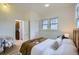 Bedroom featuring natural light and an ensuite bathroom at 513 Mt Blue Sky Rd, Golden, CO 80401