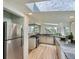 Kitchen features granite countertops, stainless appliances and a skylight at 513 Mt Blue Sky Rd, Golden, CO 80401