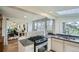 Bright, modern kitchen with stainless steel appliances and granite countertops at 513 Mt Blue Sky Rd, Golden, CO 80401