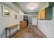 Basement kitchen with wood cabinets and stainless steel refrigerator at 513 Mt Blue Sky Rd, Golden, CO 80401