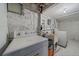 Functional laundry area with washer, dryer, and utility sink for added convenience at 513 Mt Blue Sky Rd, Golden, CO 80401