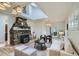 Inviting living room with stone fireplace, plush seating, and a comfortable, stylish ambiance at 513 Mt Blue Sky Rd, Golden, CO 80401