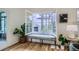 Charming window seat with scenic views, providing a cozy nook for relaxation and natural light at 513 Mt Blue Sky Rd, Golden, CO 80401