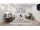 Cozy living room features modern decor, comfortable seating, and lots of natural light at 8505 S Tibet Ct, Aurora, CO 80016