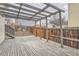Backyard featuring a rustic wood pergola, deck, wood fencing, and a small staircase at 19558 E Purdue Pl, Aurora, CO 80013