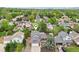 Bird's-eye view of a house, surrounded by trees, with a house icon marking its location at 6337 W 68Th Pl, Arvada, CO 80003
