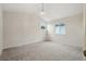 Bright bedroom featuring vaulted ceiling, carpet floors, and a chandelier at 6337 W 68Th Pl, Arvada, CO 80003