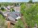 An aerial view of a home with a well-maintained roof and a spacious backyard ready for outdoor activities and relaxation at 6337 W 68Th Pl, Arvada, CO 80003