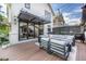 Inviting outdoor patio featuring a cozy seating area, stylish pergola, and seamless indoor-outdoor flow at 2899 Emporia Ct, Denver, CO 80238