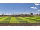 View of the baseball field with a bright blue sky at 375 Longspur Dr, Brighton, CO 80601