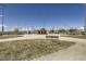 View of baseball fields and the grassy landscape on a sunny day at 375 Longspur Dr, Brighton, CO 80601
