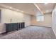 Finished basement featuring a wet bar with wine cooler, recessed lighting, and a neutral color palette at 375 Longspur Dr, Brighton, CO 80601