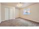 Cozy basement bedroom with a window and a closet providing ample natural light and storage space at 375 Longspur Dr, Brighton, CO 80601